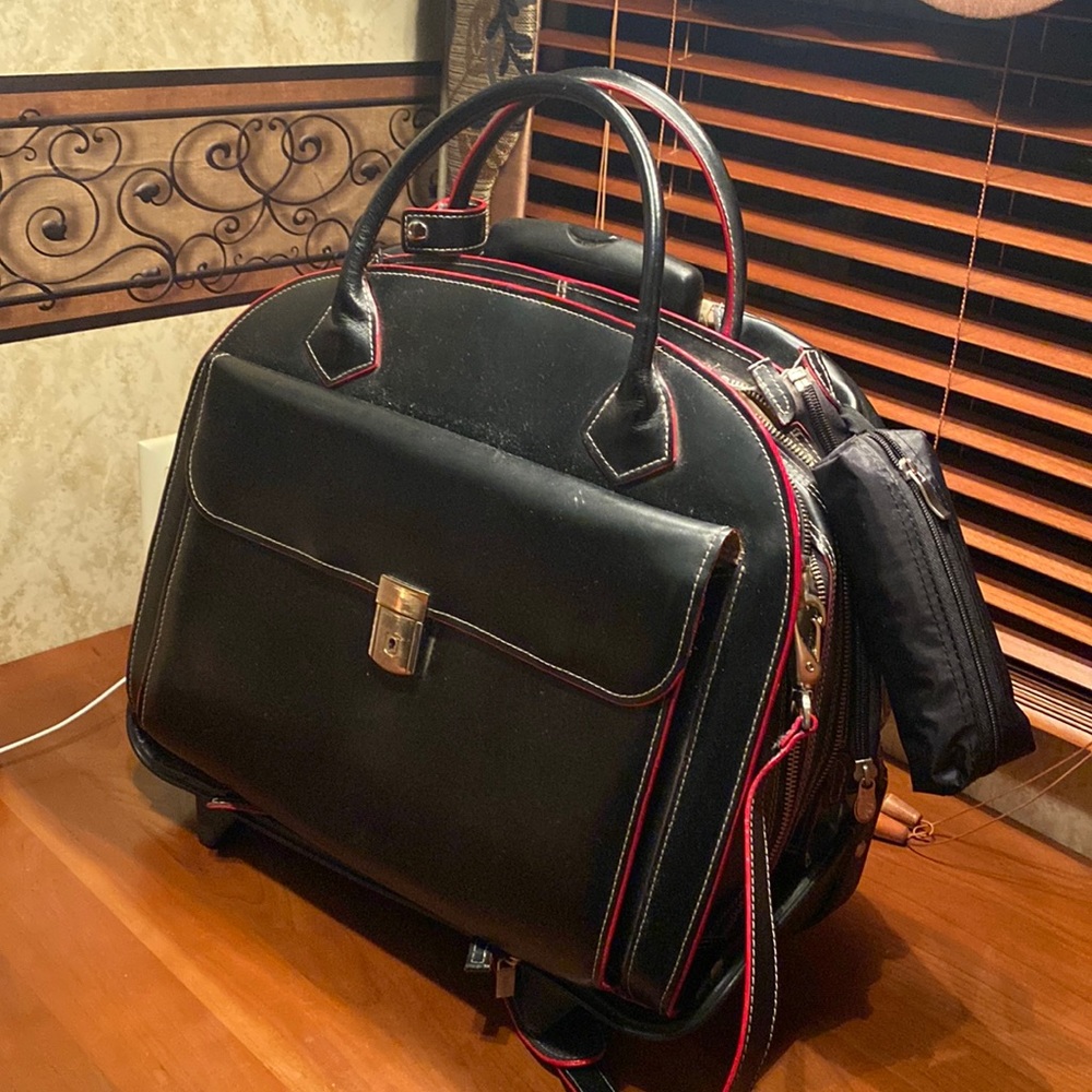 Leather suit case for laptop, books, documents, etc